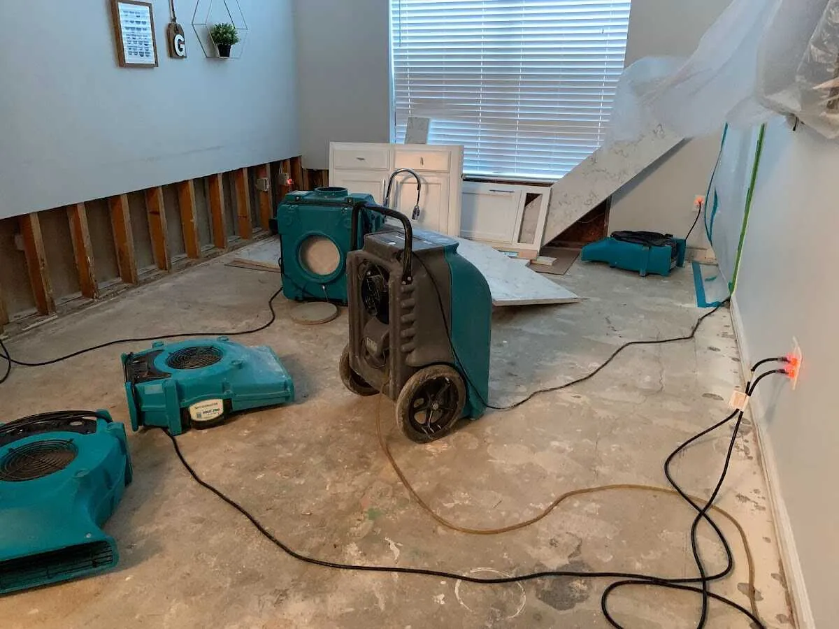 Dehumidifier in flood-cut room for Water Damage Restoration in Washington